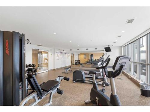 303-550 Riverfront Avenue Se, Calgary, AB - Indoor Photo Showing Gym Room