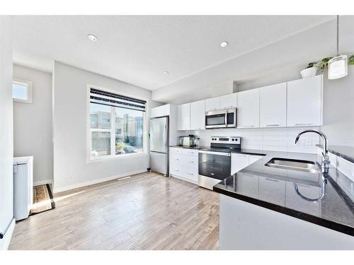 404-70 Saddlestone Drive Ne, Calgary, AB - Indoor Photo Showing Kitchen With Stainless Steel Kitchen