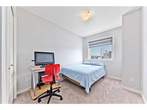 404-70 Saddlestone Drive Ne, Calgary, AB - Indoor Photo Showing Bedroom