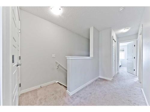 404-70 Saddlestone Drive Ne, Calgary, AB - Indoor Photo Showing Other Room