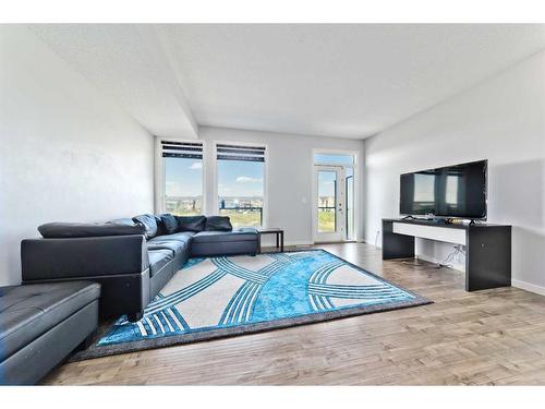 404-70 Saddlestone Drive Ne, Calgary, AB - Indoor Photo Showing Living Room