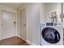 302-505 19 Avenue Sw, Calgary, AB  - Indoor Photo Showing Laundry Room 