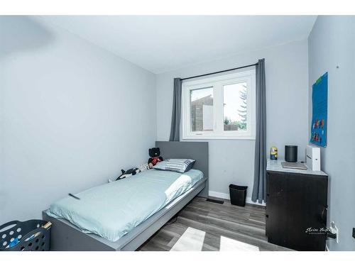 109 Mckerrell Way Se, Calgary, AB - Indoor Photo Showing Bedroom