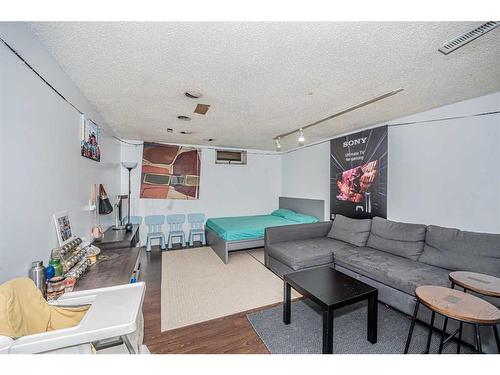 109 Mckerrell Way Se, Calgary, AB - Indoor Photo Showing Living Room