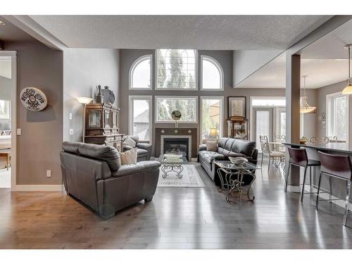 189 Cranleigh Terrace Se, Calgary, AB - Indoor Photo Showing Living Room With Fireplace