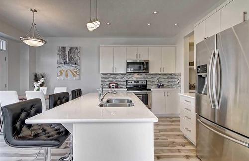 366 Windrow Crescent Sw, Airdrie, AB - Indoor Photo Showing Kitchen With Stainless Steel Kitchen With Double Sink With Upgraded Kitchen