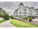 109-1 Crystal Green Lane, Okotoks, AB  - Outdoor With Facade 