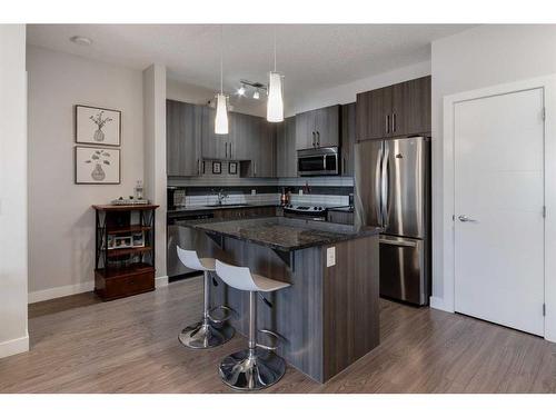 309-16 Sage Hill Terrace Nw, Calgary, AB - Indoor Photo Showing Kitchen With Upgraded Kitchen