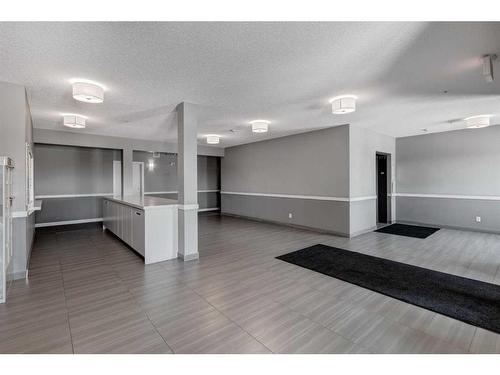 309-16 Sage Hill Terrace Nw, Calgary, AB - Indoor Photo Showing Other Room