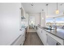 402-122 Mahogany Centre Se, Calgary, AB  - Indoor Photo Showing Kitchen With Double Sink With Upgraded Kitchen 