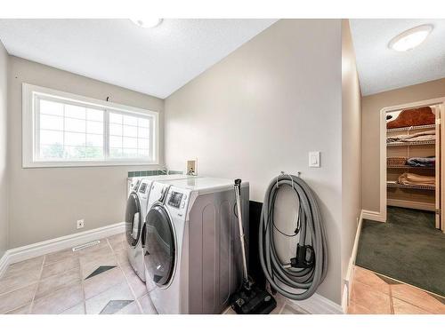 246025 20 Street East, Rural Foothills County, AB - Indoor Photo Showing Laundry Room