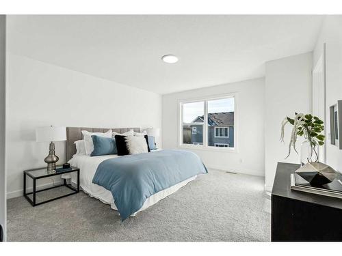 23 Saddlebred Place, Cochrane, AB - Indoor Photo Showing Bedroom