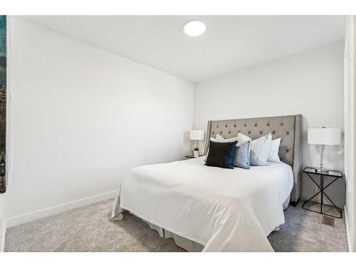 23 Saddlebred Place, Cochrane, AB - Indoor Photo Showing Bedroom