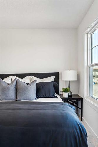 23 Saddlebred Place, Cochrane, AB - Indoor Photo Showing Bedroom