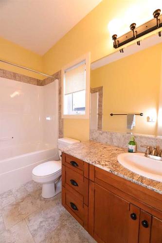 672 Royalite Way, Diamond Valley, AB - Indoor Photo Showing Bathroom