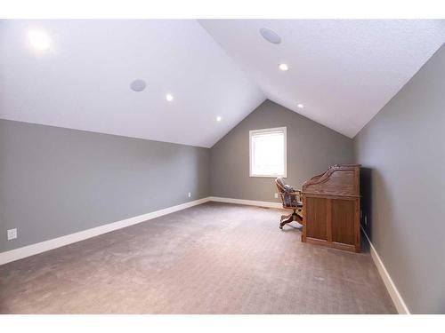 672 Royalite Way, Diamond Valley, AB - Indoor Photo Showing Other Room