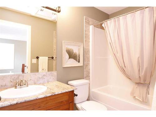 672 Royalite Way, Diamond Valley, AB - Indoor Photo Showing Bathroom