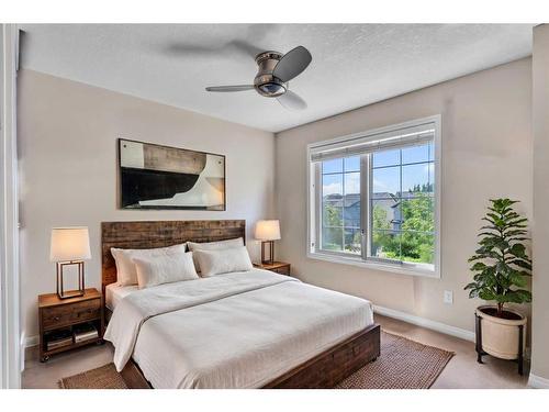 10 Cranford Drive Se, Calgary, AB - Indoor Photo Showing Bedroom