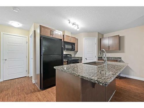 11201-2781 Chinook Winds Drive Sw, Airdrie, AB - Indoor Photo Showing Kitchen With Upgraded Kitchen