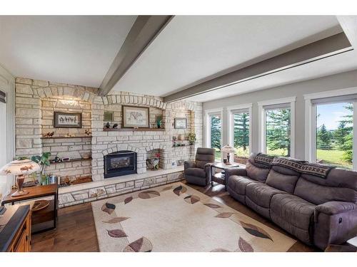 40 Mount Vista Estates, Rural Rocky View County, AB - Indoor Photo Showing Living Room With Fireplace