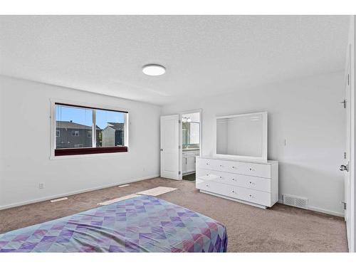 123 Walden Heights Se, Calgary, AB - Indoor Photo Showing Bedroom