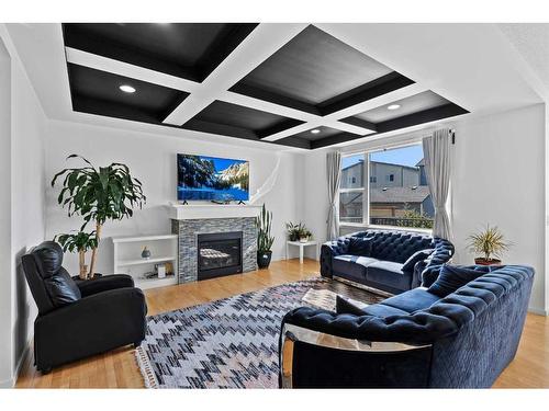 123 Walden Heights Se, Calgary, AB - Indoor Photo Showing Living Room With Fireplace