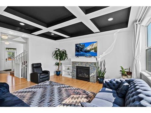 123 Walden Heights Se, Calgary, AB - Indoor Photo Showing Living Room With Fireplace