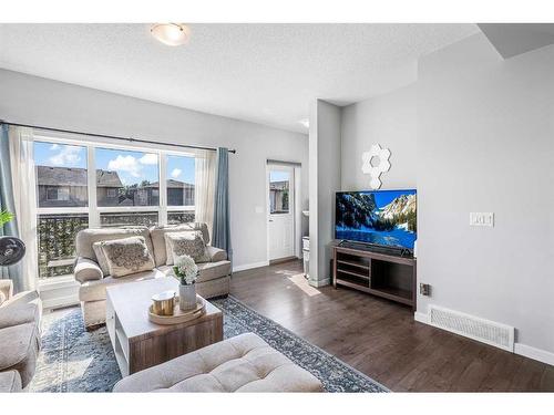 307 Walgrove Boulevard Se, Calgary, AB - Indoor Photo Showing Living Room