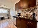 203-312 15 Avenue Ne, Calgary, AB  - Indoor Photo Showing Kitchen With Double Sink 