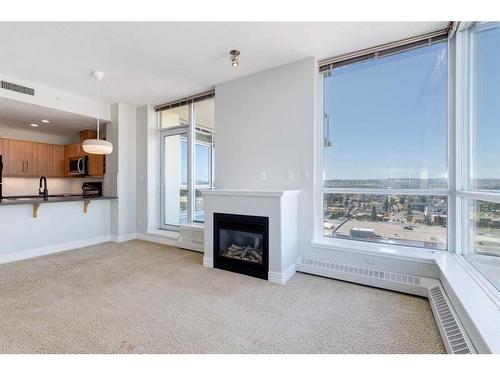 1507-55 Spruce Place Sw, Calgary, AB - Indoor With Fireplace