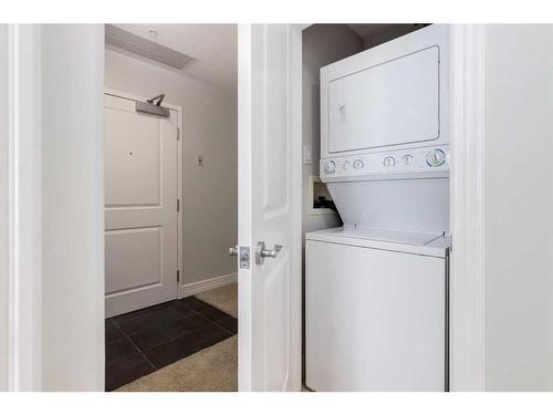 1507-55 Spruce Place Sw, Calgary, AB - Indoor Photo Showing Laundry Room