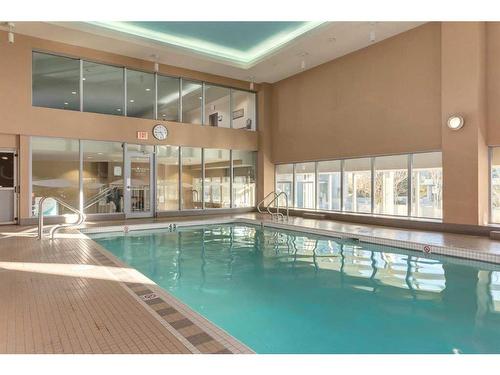 1507-55 Spruce Place Sw, Calgary, AB - Indoor Photo Showing Other Room With In Ground Pool