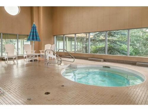 1507-55 Spruce Place Sw, Calgary, AB - Indoor Photo Showing Other Room With In Ground Pool