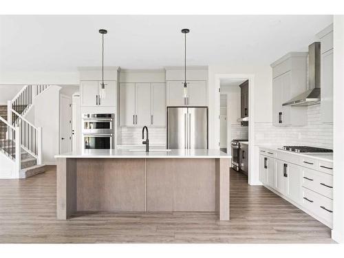 176 Sandpiper Landing, Chestermere, AB - Indoor Photo Showing Kitchen With Stainless Steel Kitchen With Upgraded Kitchen