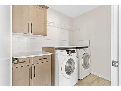 176 Sandpiper Landing, Chestermere, AB - Indoor Photo Showing Laundry Room