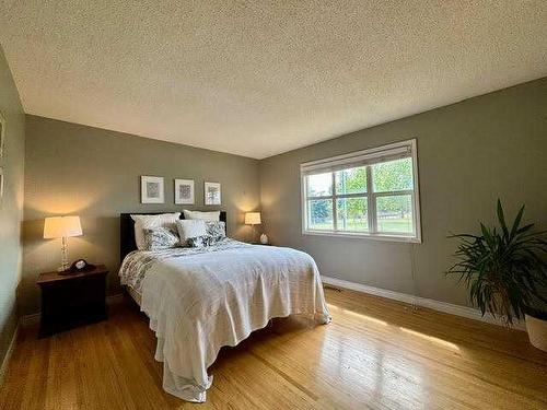 2311 Lake Bonavista Drive Se, Calgary, AB - Indoor Photo Showing Bedroom