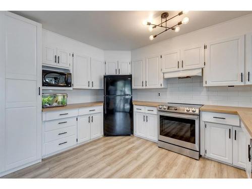 96 Pensacola Close Se, Calgary, AB - Indoor Photo Showing Kitchen