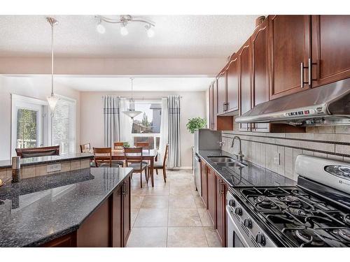 356 Windermere Drive, Chestermere, AB - Indoor Photo Showing Kitchen With Double Sink