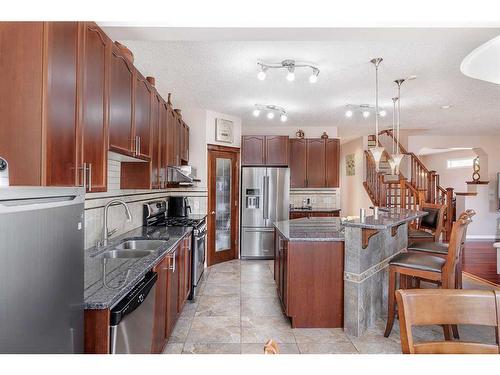 356 Windermere Drive, Chestermere, AB - Indoor Photo Showing Kitchen With Double Sink With Upgraded Kitchen