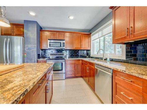 1227 Ninga Road Nw, Calgary, AB - Indoor Photo Showing Kitchen With Stainless Steel Kitchen