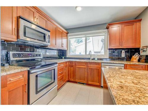 1227 Ninga Road Nw, Calgary, AB - Indoor Photo Showing Kitchen With Stainless Steel Kitchen