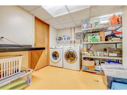 1227 Ninga Road Nw, Calgary, AB - Indoor Photo Showing Laundry Room