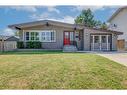 1227 Ninga Road Nw, Calgary, AB  - Outdoor With Deck Patio Veranda With Facade 