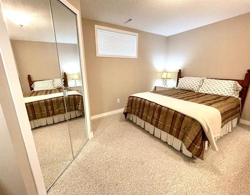 1901 Riverside Road Nw, High River, AB - Indoor Photo Showing Bedroom