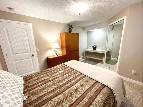 1901 Riverside Road Nw, High River, AB - Indoor Photo Showing Bedroom