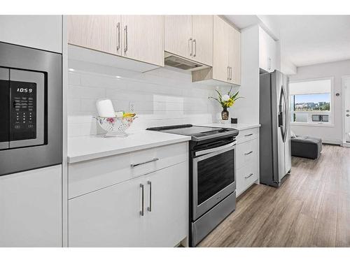 503-138 Sage Valley Common Nw, Calgary, AB - Indoor Photo Showing Kitchen With Stainless Steel Kitchen With Upgraded Kitchen