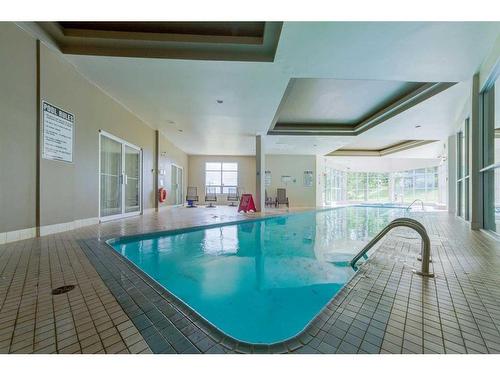 4-226 Village Terrace Sw, Calgary, AB - Indoor Photo Showing Other Room With In Ground Pool