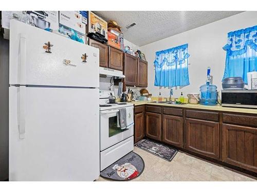 5706 2 Street Sw, Calgary, AB - Indoor Photo Showing Kitchen With Double Sink