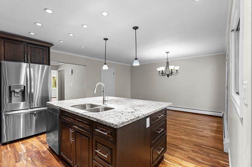 810-3130 66 Avenue Sw, Calgary, AB - Indoor Photo Showing Kitchen With Stainless Steel Kitchen With Double Sink With Upgraded Kitchen