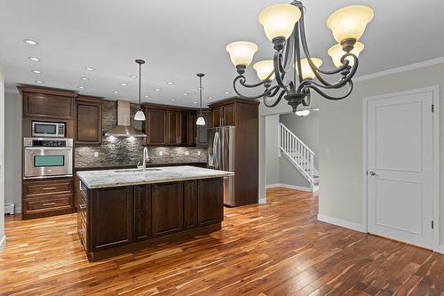 810-3130 66 Avenue Sw, Calgary, AB - Indoor Photo Showing Kitchen With Stainless Steel Kitchen With Upgraded Kitchen